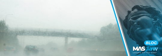 Rain while driving under an overpass | MAS Law