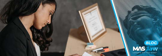 A lawyer looking at a case | MAS Law