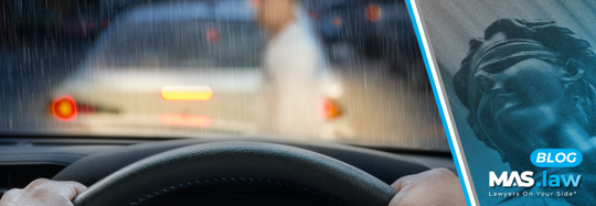 A driver about to hit a pedestrian while it's raining | MAS Law
