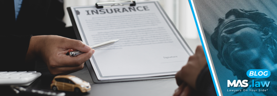 Insurance company worker explaining their policy | MAS Law