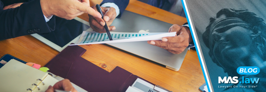 Two people negotiating a claim | MAS Law