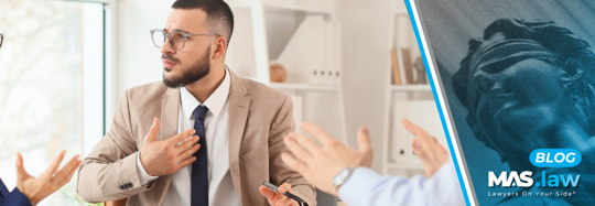 A man arguing with Insurance Adjusters | MAS Law