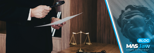 Attorney looking at a contract | MAS Law