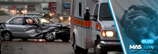 car accident on highway with ambulance | MAS Law
