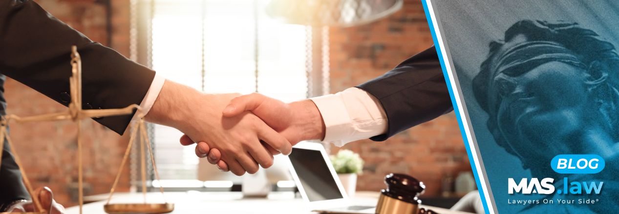 Attorney and client shaking hands