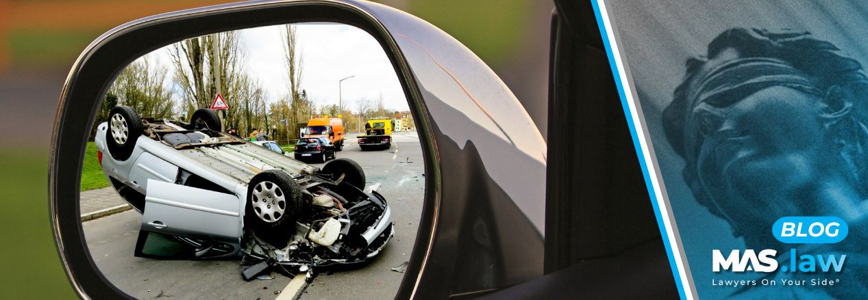 Car accident in the side mirror of a car | MAS Law