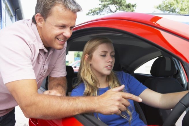 A father teaching his daughter how to drive | MAS Law