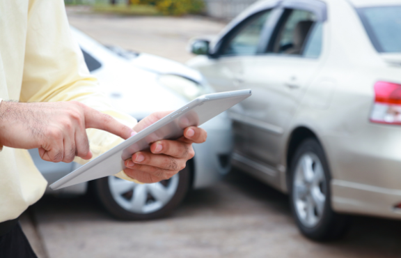 Filling out an insurance claim after a car accident | MAS Law