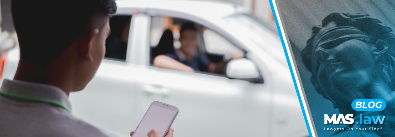 Man waiting for his rideshare service.