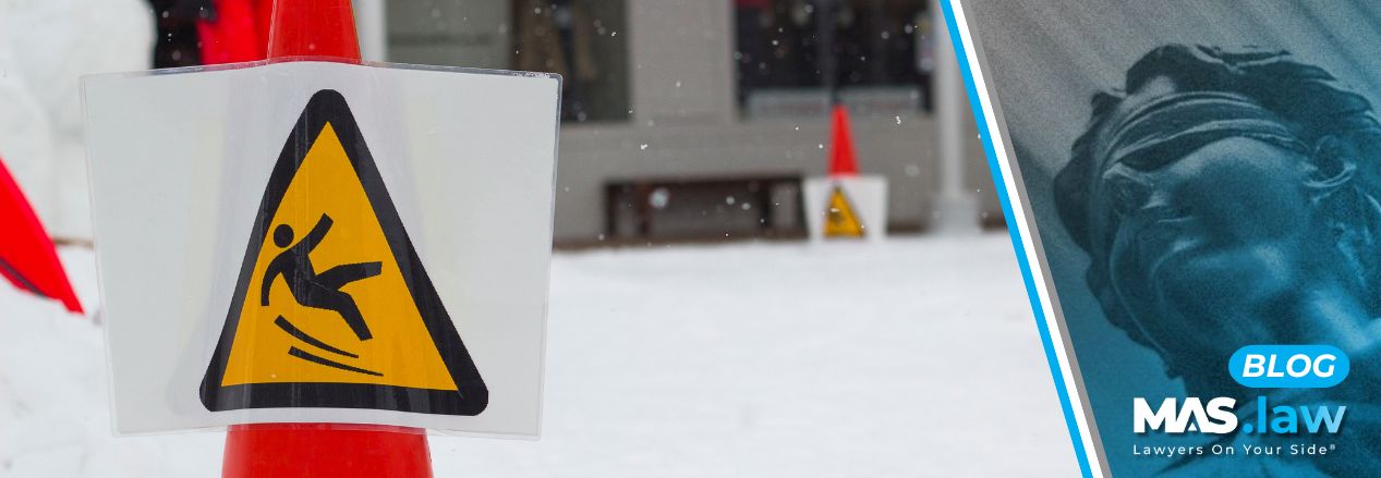 Cone warning people to not slip and fall on the ice.