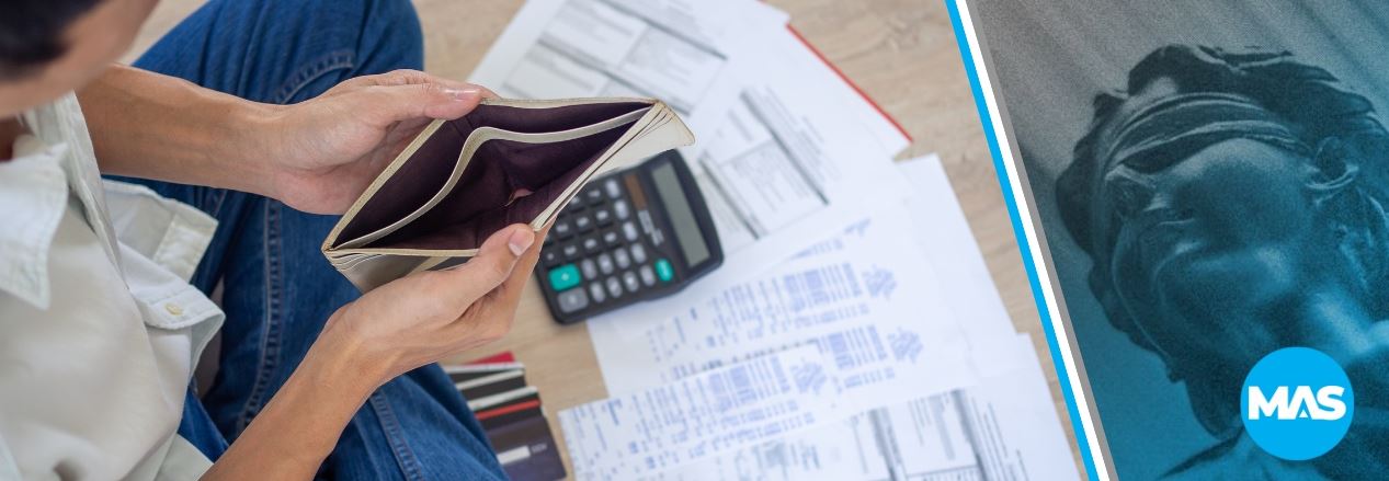 Man looking at empty wallet after an accident. 